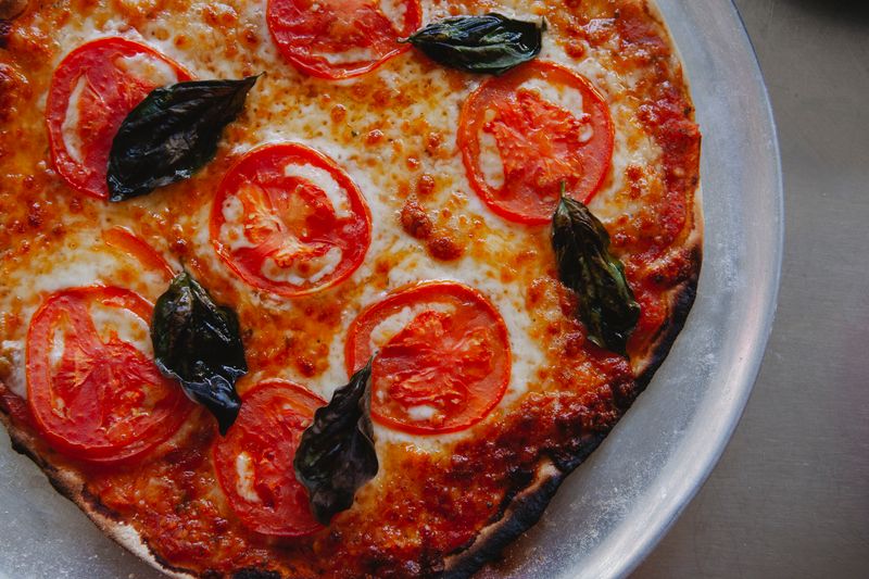 Margherita Thin Crust Pizza with fresh basil